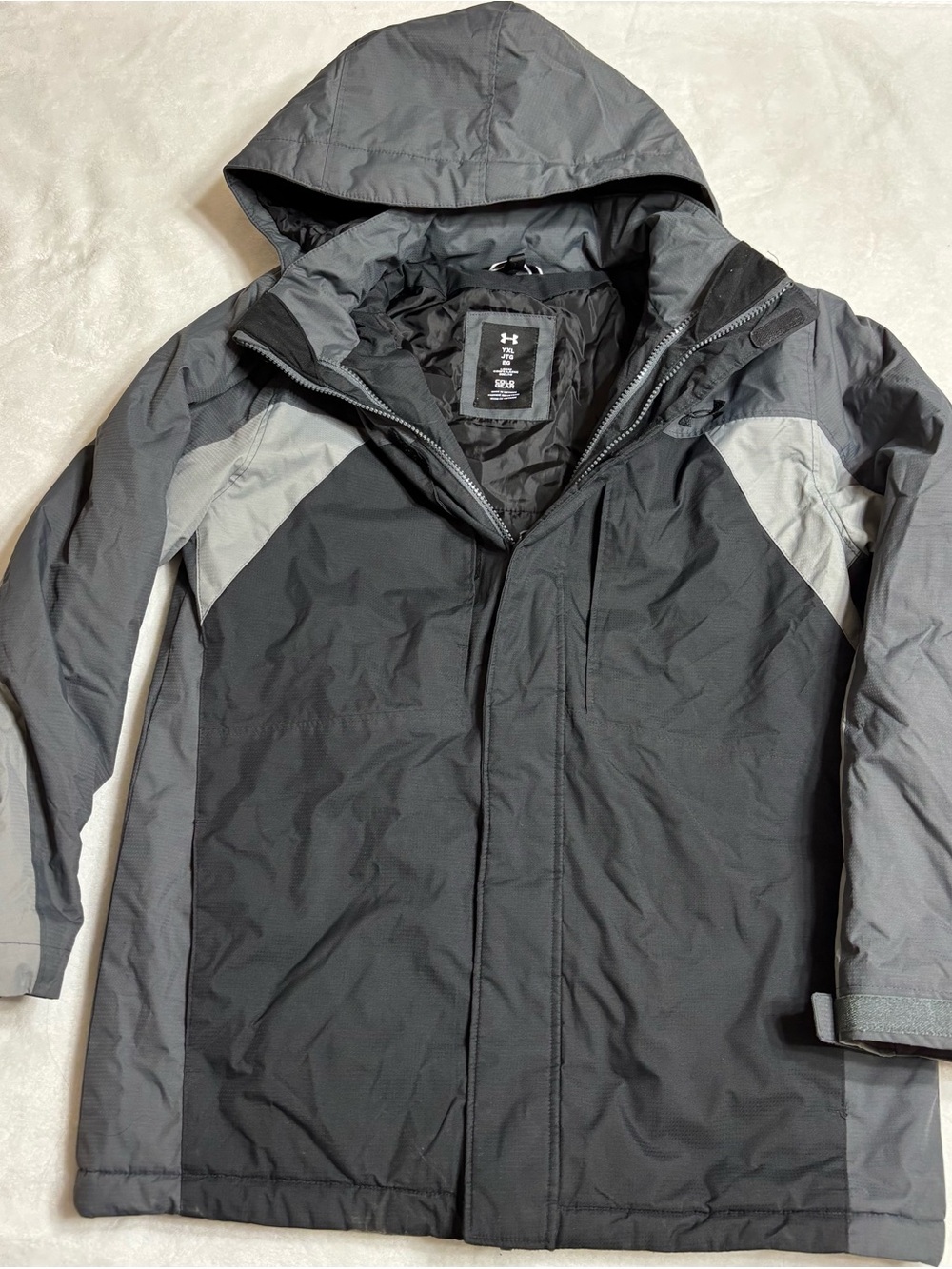 Under Armour Boy’s Hooded Jacket in Black and Gray *small cut in cuff as shown*